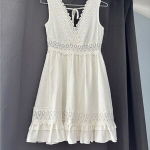 Sleeveless White Lace V-Neck Mini Dress